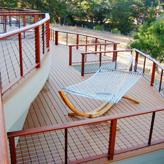Deck area featuring a hammock, exotic hardwood and Feeney DesignRail with CableRail infill.
