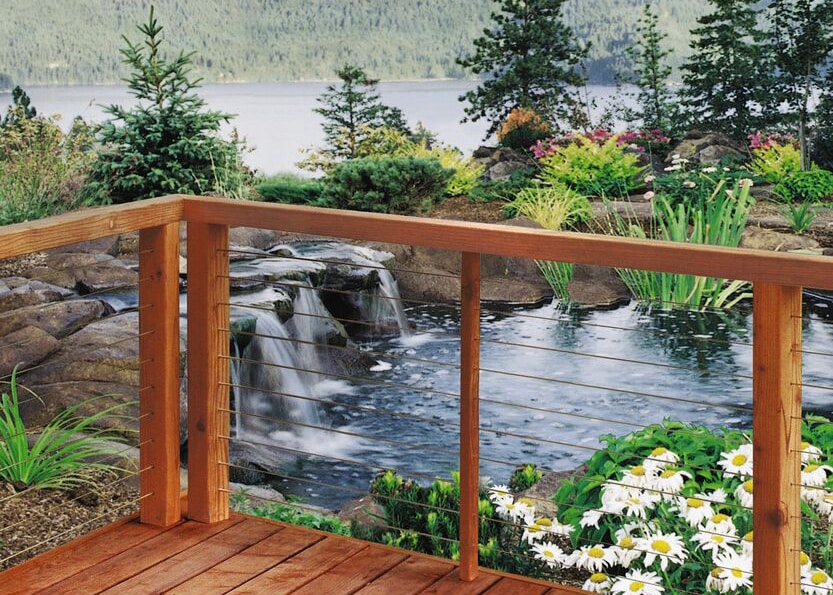lake and pond with wood cable railing
