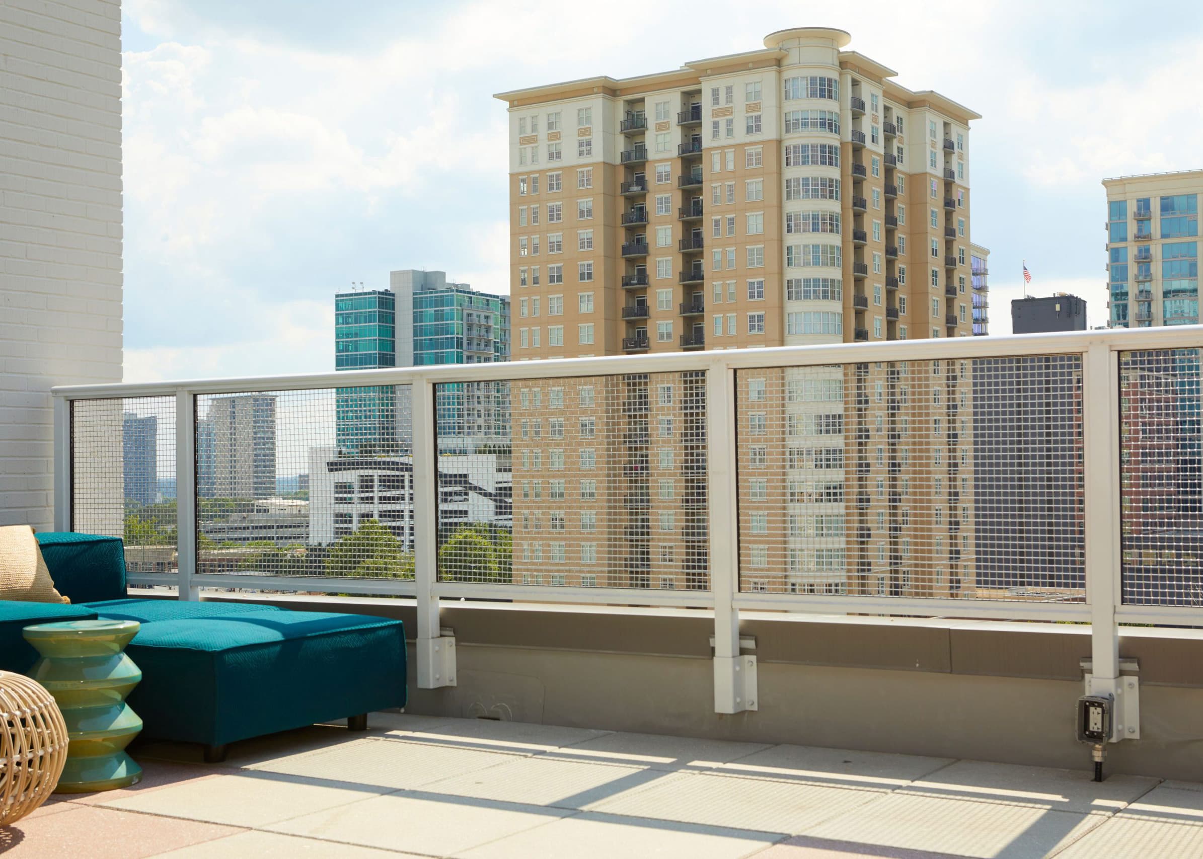 Mid-Century Style in Atlanta – Hotel Rooftop Bar Featuring DesignRail® with Stainless Steel Mesh