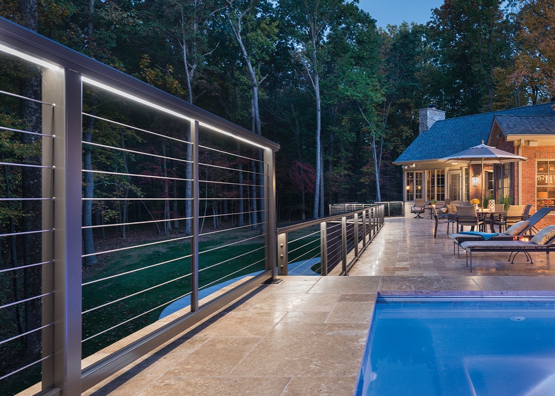 LED lighting design railing exterior patio of home by pool