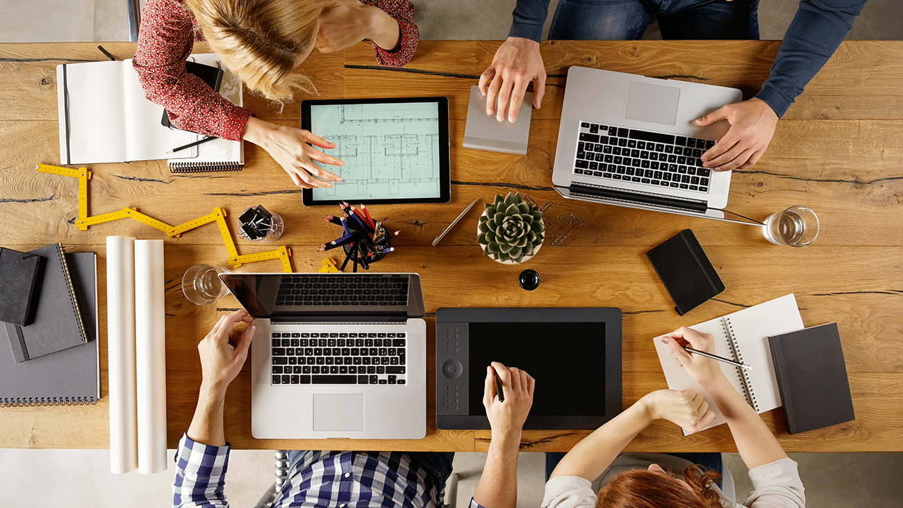 upper view of people around a table working