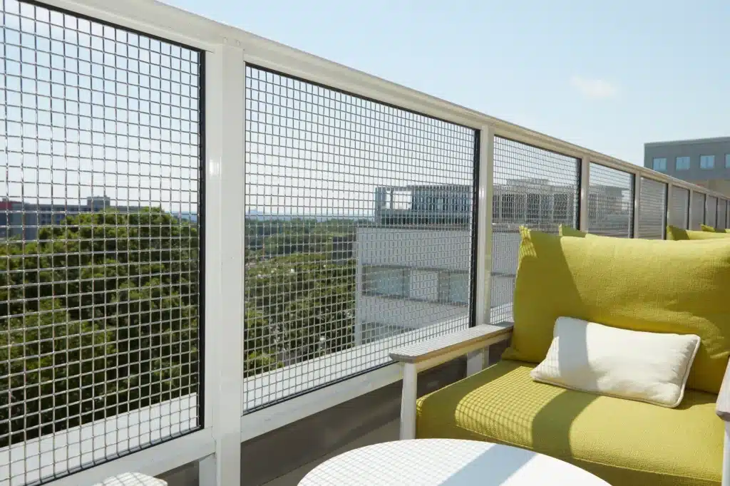 Mesh railing wrapped lounge overlooking the Atlanta skyline
